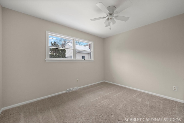 empty room with carpet floors and ceiling fan