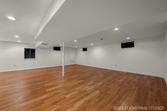 basement featuring light hardwood / wood-style flooring