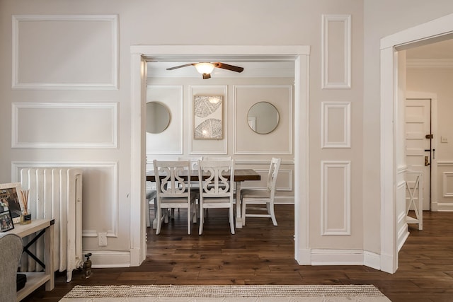 dining space featuring ornamental molding, dark hardwood / wood-style floors, radiator, and ceiling fan