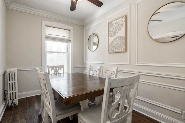 dining area with ornamental molding, dark hardwood / wood-style floors, and radiator