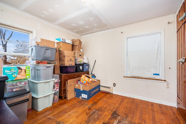 storage area with baseboard heating