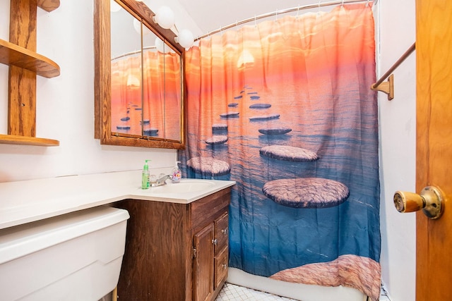 bathroom with vanity and toilet