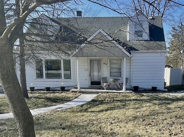 view of front of property with a front lawn