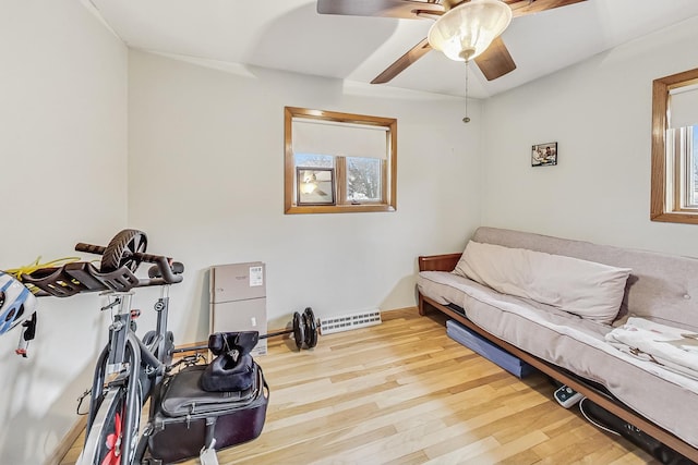 interior space featuring light wood-type flooring and ceiling fan