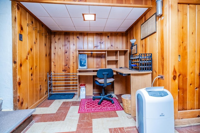 home office with wood walls