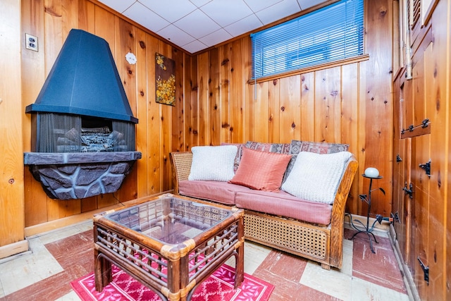 living room featuring wood walls