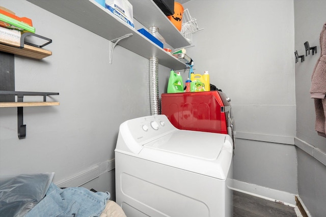 clothes washing area with washer and clothes dryer