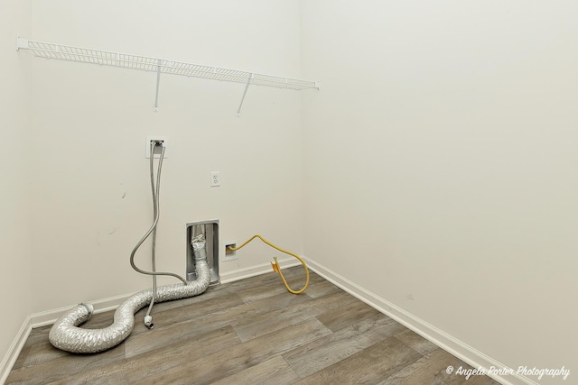 laundry area with washer hookup and hardwood / wood-style floors