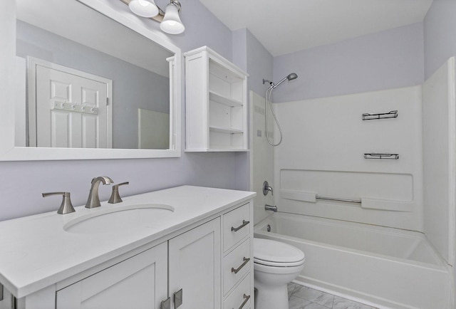 full bathroom featuring shower / bath combination, vanity, and toilet