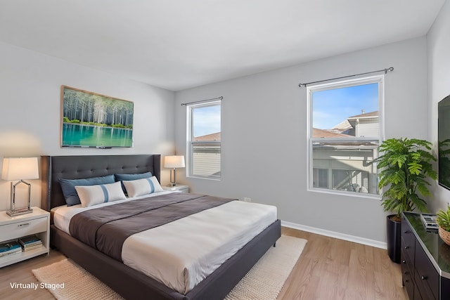 bedroom featuring light wood-type flooring