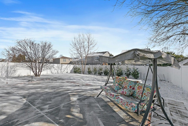 view of snow covered patio