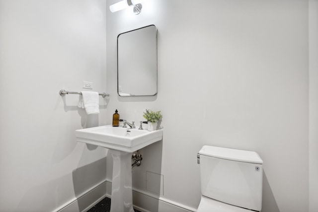 bathroom featuring toilet