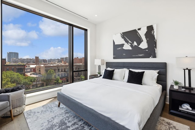 bedroom featuring wood-type flooring