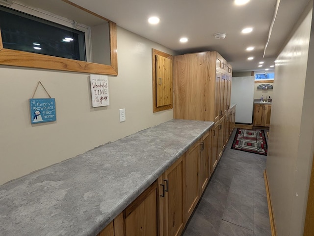 interior space featuring dark tile patterned floors