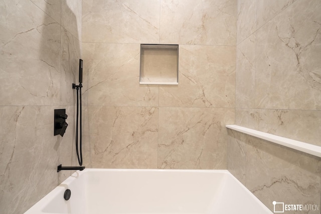 bathroom featuring a washtub