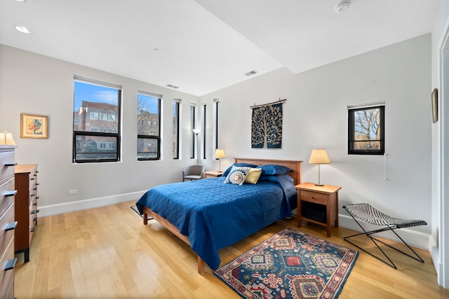 bedroom featuring light hardwood / wood-style floors