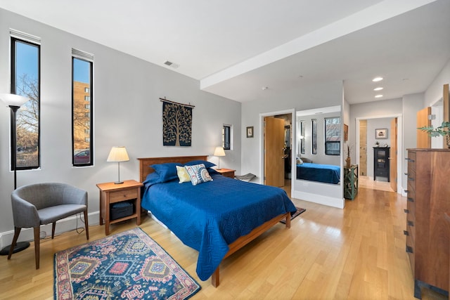 bedroom featuring light hardwood / wood-style flooring