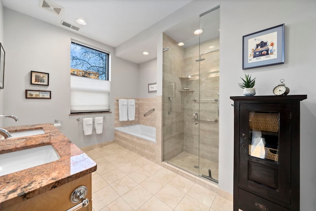 bathroom featuring vanity and plus walk in shower