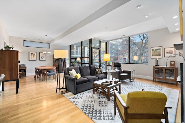 living room with light hardwood / wood-style floors