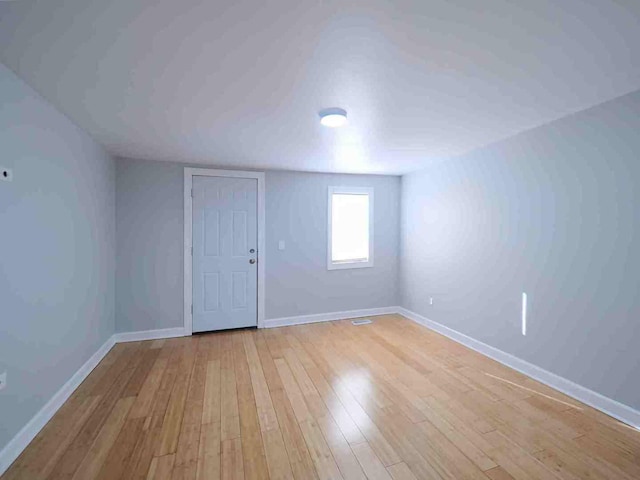 unfurnished room featuring light wood-type flooring