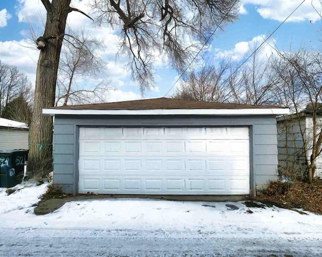 view of snow covered garage