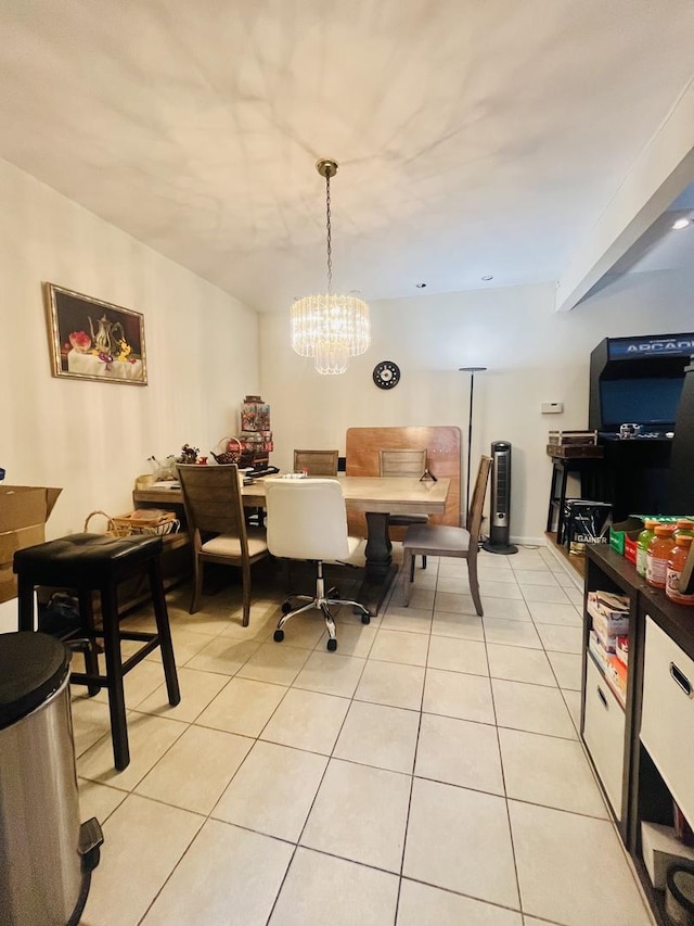 dining room featuring light tile patterned flooring and a chandelier