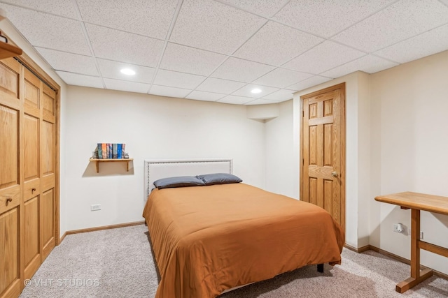 bedroom featuring recessed lighting, baseboards, and light colored carpet