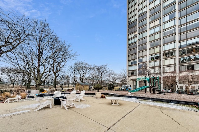 view of home's community featuring a playground