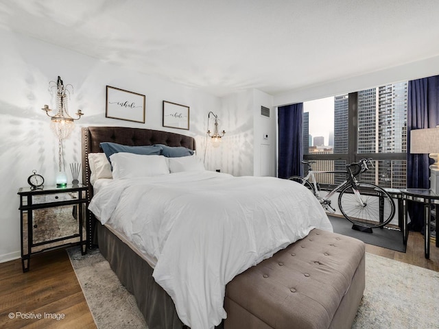 bedroom featuring hardwood / wood-style flooring