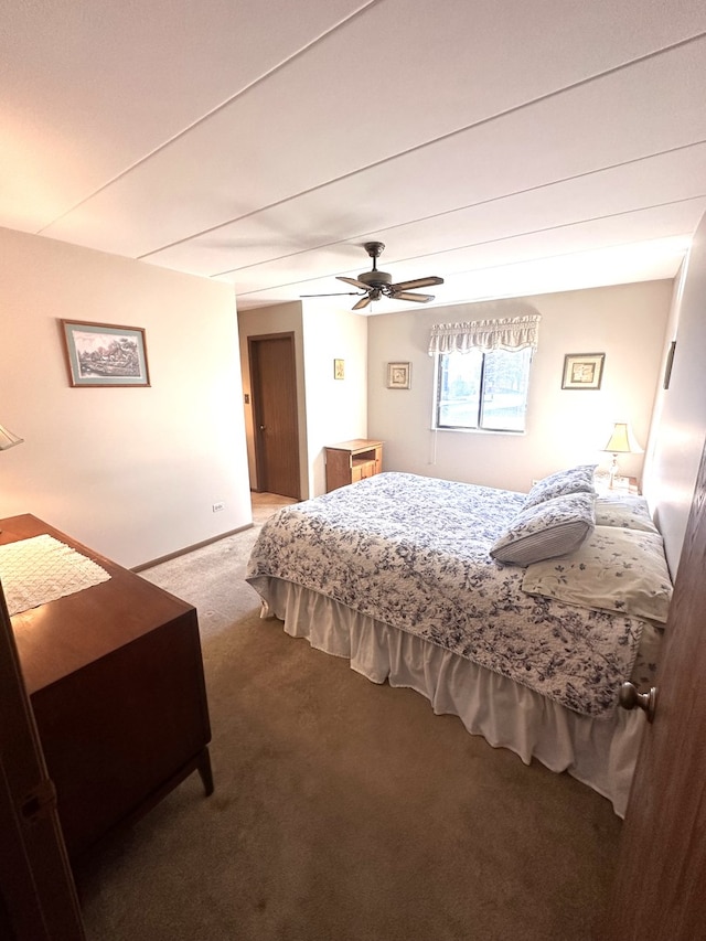 bedroom with ceiling fan and carpet