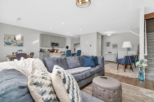 living room with light hardwood / wood-style flooring