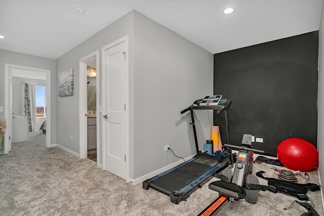 exercise area featuring carpet flooring