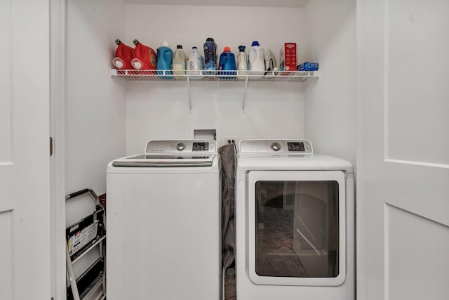 laundry area with washer and clothes dryer