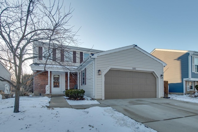 front facade with a garage