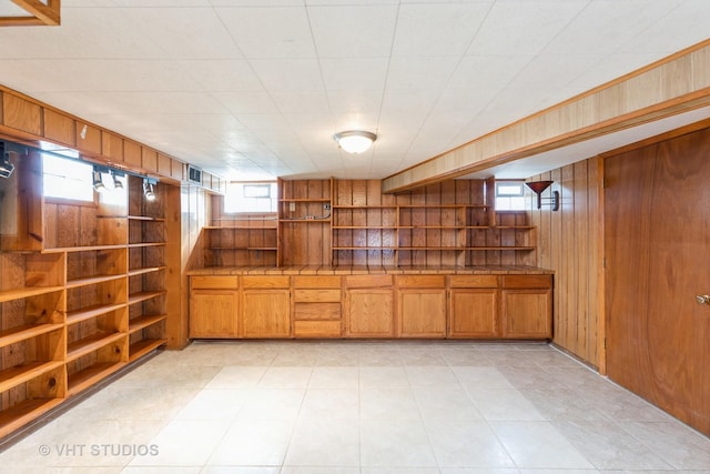 bar with a wealth of natural light and wood walls