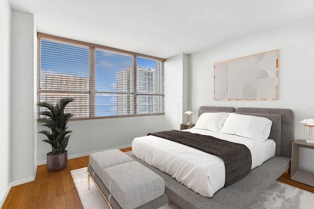 bedroom featuring hardwood / wood-style floors