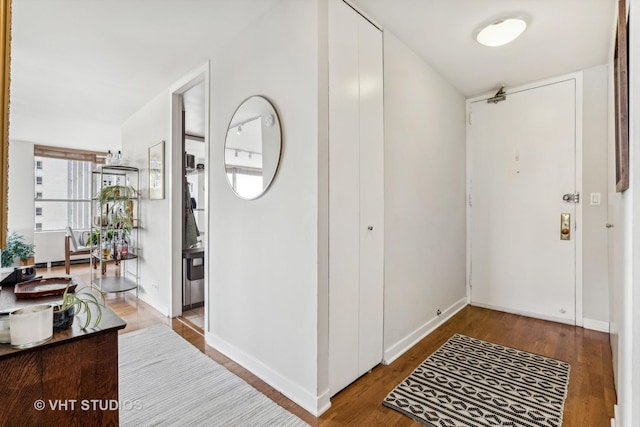 foyer featuring hardwood / wood-style floors