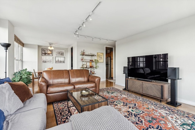 living room with ceiling fan