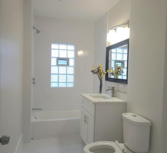 full bathroom featuring toilet, vanity, and shower / tub combination