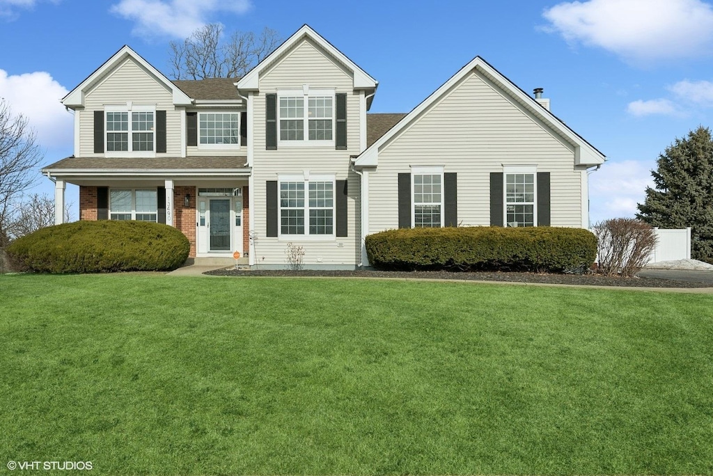 view of front property with a front lawn