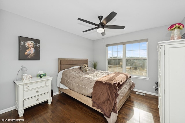 bedroom featuring dark wood-type flooring and ceiling fan