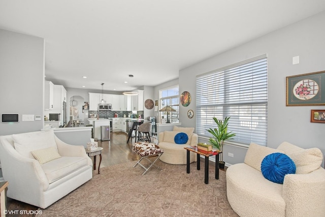 living room featuring light wood-type flooring