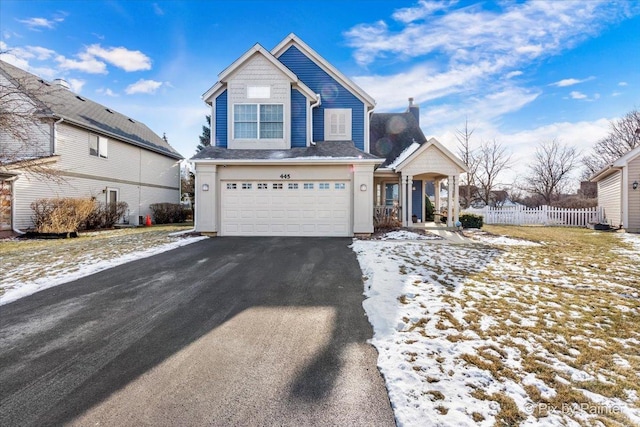 front of property with a garage