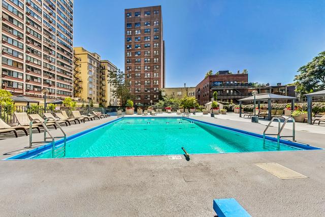 view of swimming pool featuring a gazebo and a patio area