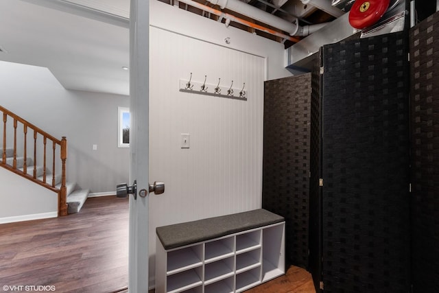 mudroom featuring dark wood-type flooring