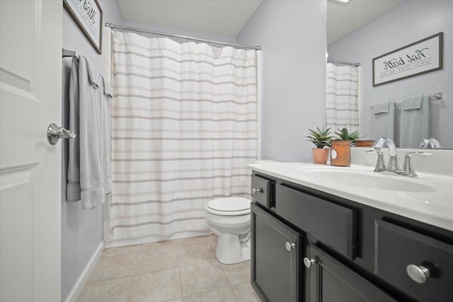 bathroom with vanity, toilet, and walk in shower