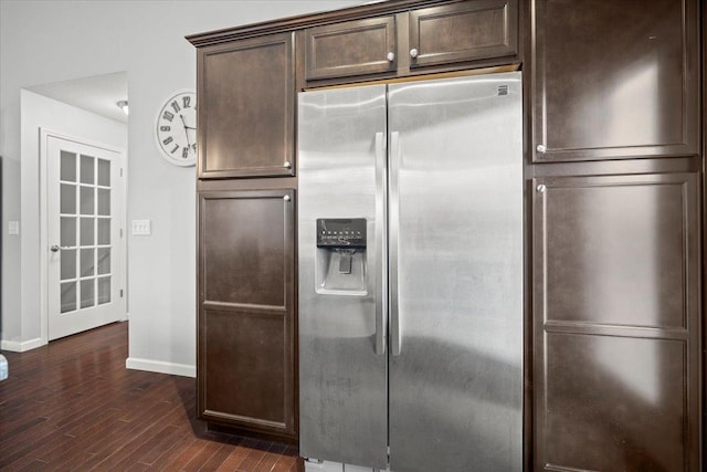 kitchen featuring stainless steel refrigerator with ice dispenser, dark hardwood / wood-style floors, and dark brown cabinets