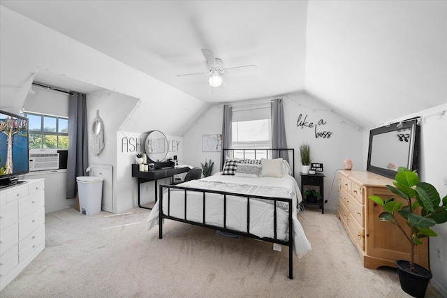 carpeted bedroom with lofted ceiling and ceiling fan