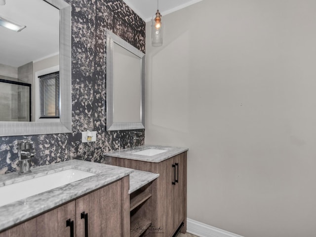 bathroom with decorative backsplash, an enclosed shower, and vanity