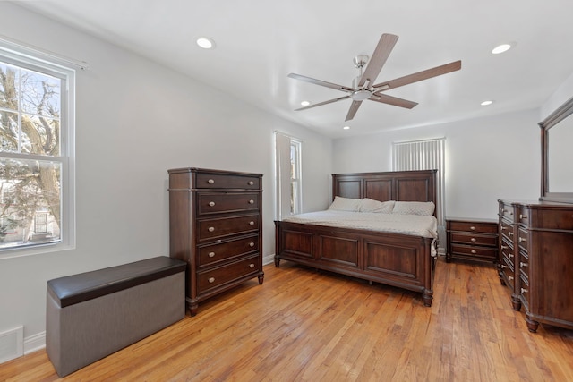 bedroom featuring ceiling fan and light wood-type flooring